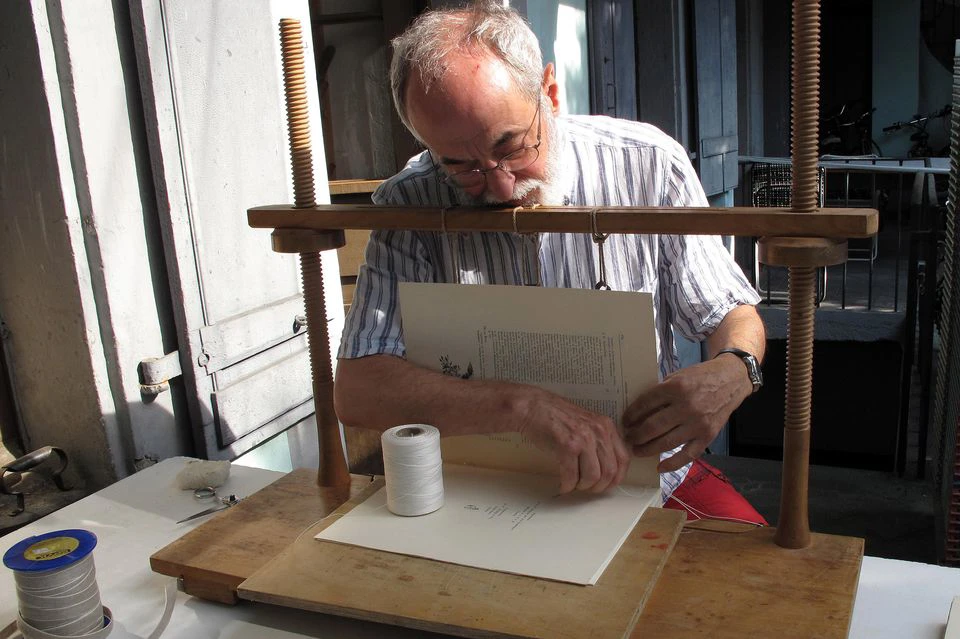 GE_michel_magnin_restaurateur_livres_relieur_portrait.jpg